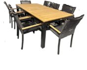 The Kensington Outdoor Dining Set embodies a sense of upscale luxury, making it an ideal choice for both indoor and outdoor settings.   Constructed with Premium SOL Teak™ top and a black aluminum frame, this table is meant to look like real teak but without the necessary upkeep. Whether you choose to place it beneath the gentle embrace of a shade tree, under the elegant structure of a pergola, or within the cozy confines of a covered patio, this exquisite set is designed to meet all your dining needs with style and sophistication.  6 black rope chairs accompany this set as well as sunbrella fabric cushions.